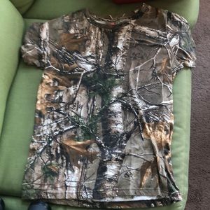 Never worn ladies camo short sleeved t shirt.